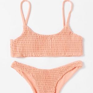 Smocked bikini in peach. Never worn w/ tags